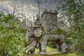 Hannibals elephant catching a Roman legionary, statue in famous park of the monsters in Bomarzo Italy